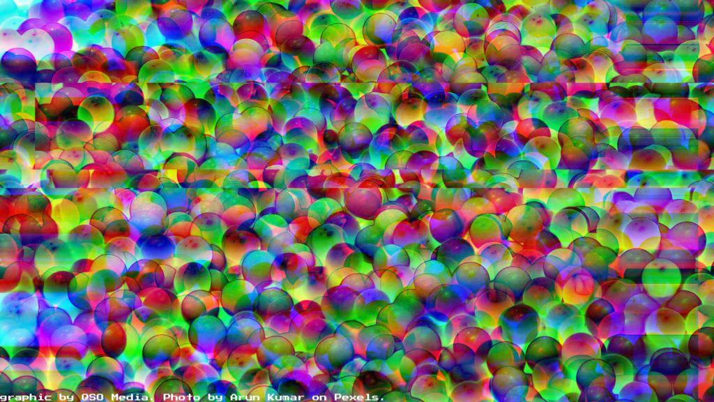 Some glitched-out rainbow coloured balls in a ball pit.