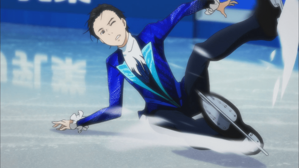 Yuuri Katsuki falling on the ice in Yuri on Ice showing his skates in the air. He looks distressed.